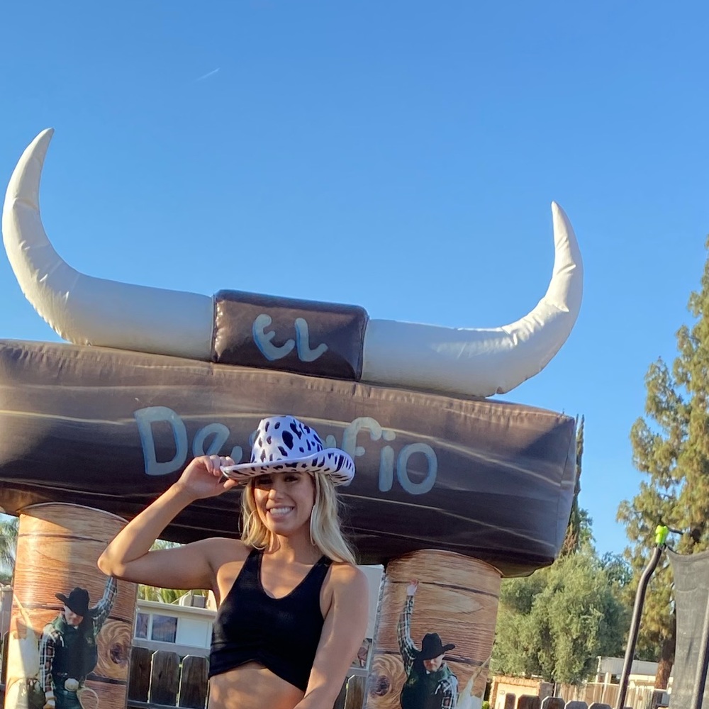 Cow print cowgirl hat